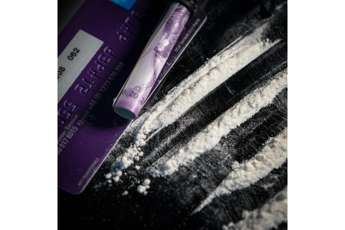 Two charged after stash of class A drugs, cash and illegal vapes found