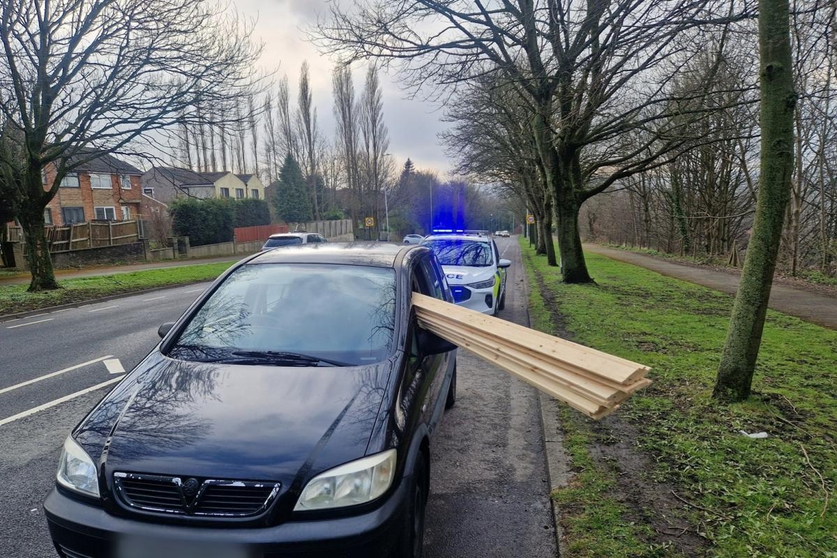 Car with planks of wood sticking out of window stopped by police in Bradford