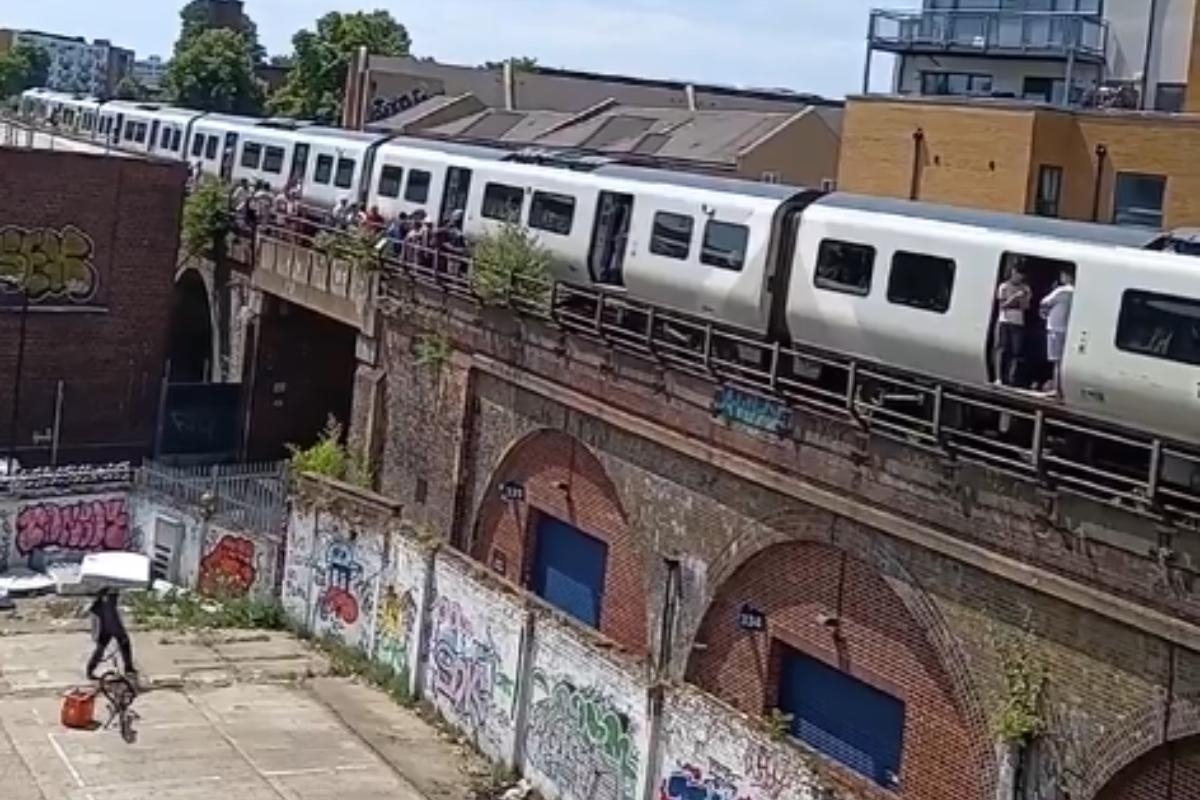 Viral video shows Just Eat driver toss delivery into Thameslink during heatwave chaos