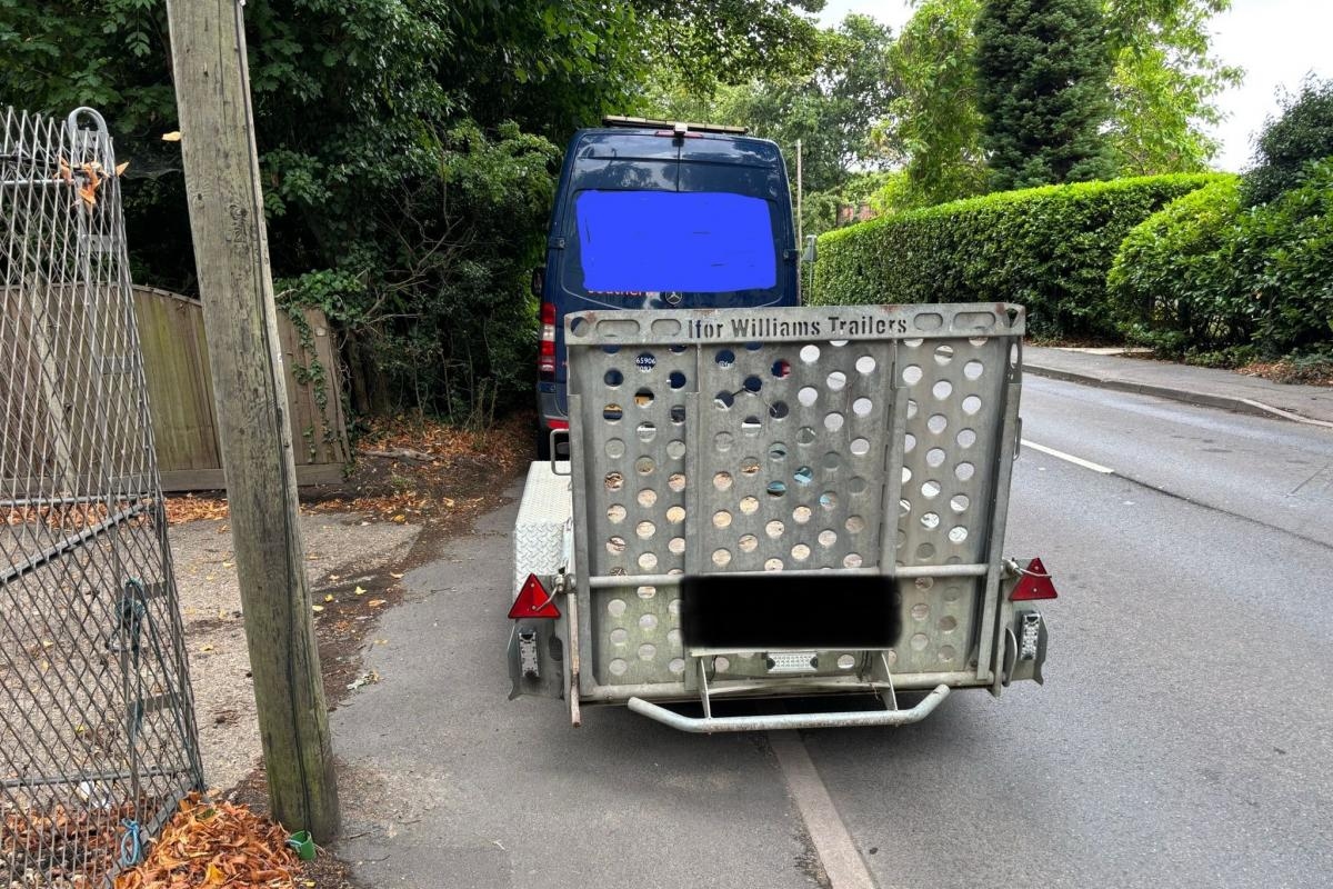Driver reported after being caught talking on phone while driving