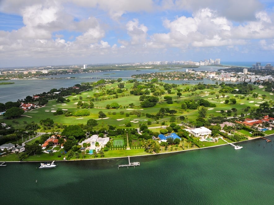 Billionaires create compounds for privacy and status — and their neighbors get richer, too