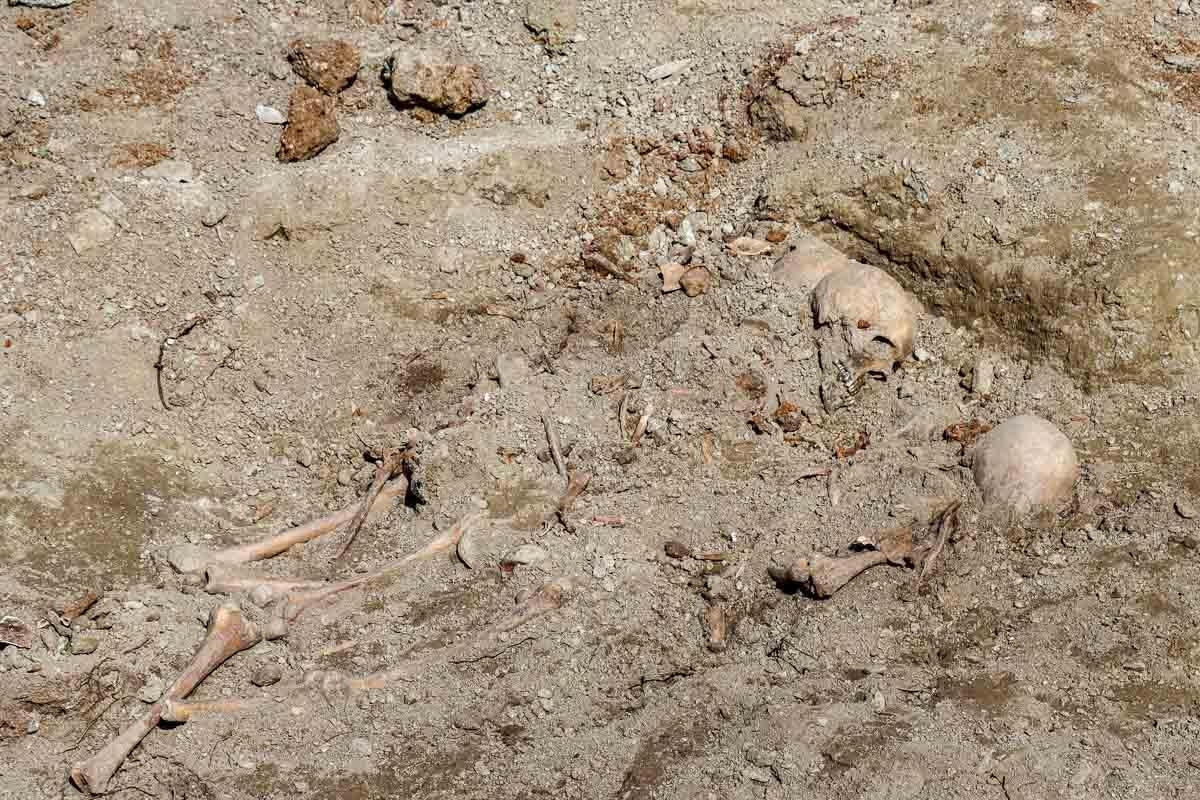Construction work unearths remains of 33 skeletons, woman's shoe