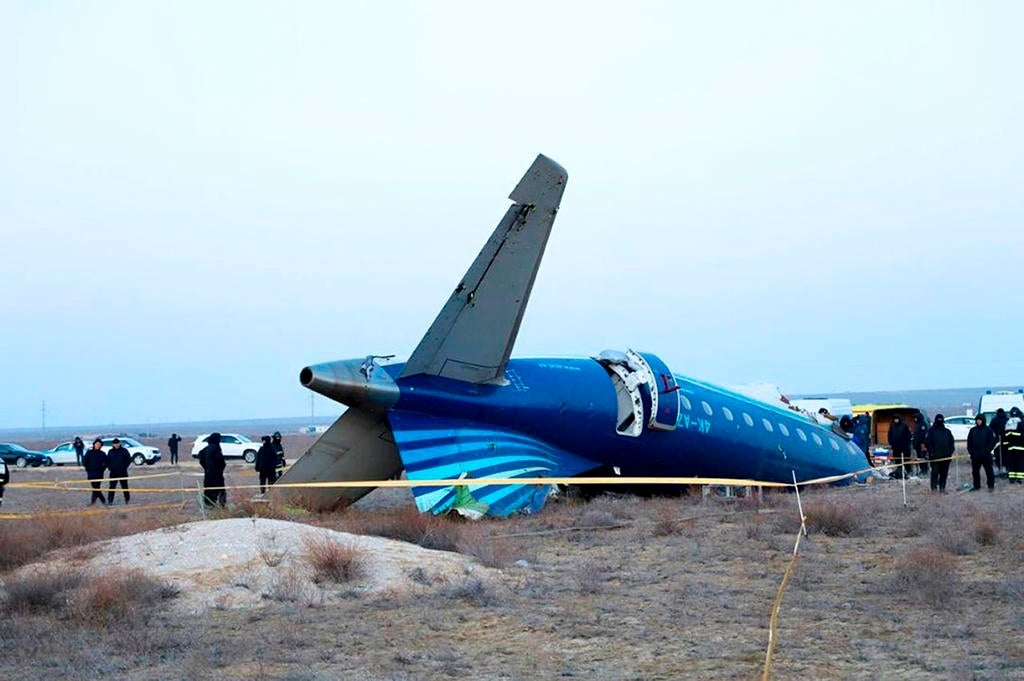 Azerbaijan jet that crashed was riddled with holes, report says