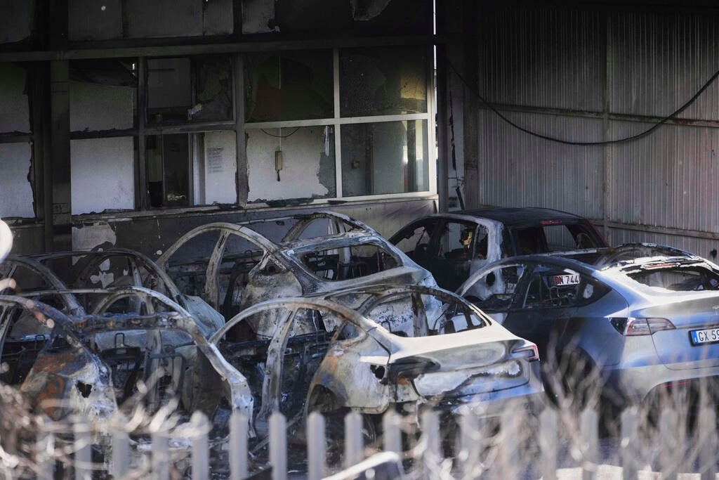Tesla EVs, charging stations targeted by possible arson in Italy and France