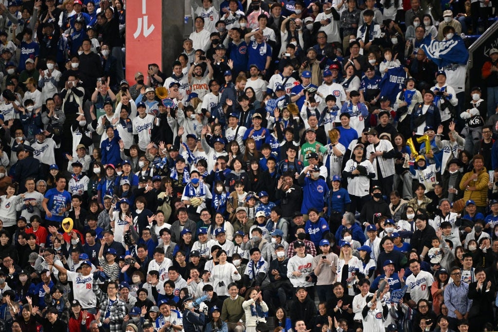 Here's why you may be seeing Reds hats at the Dodgers-Cubs Tokyo Series