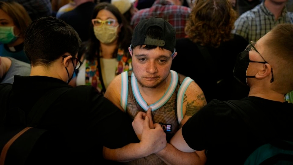 Iowa gives final approval to a bill removing gender identity protections despite massive protests