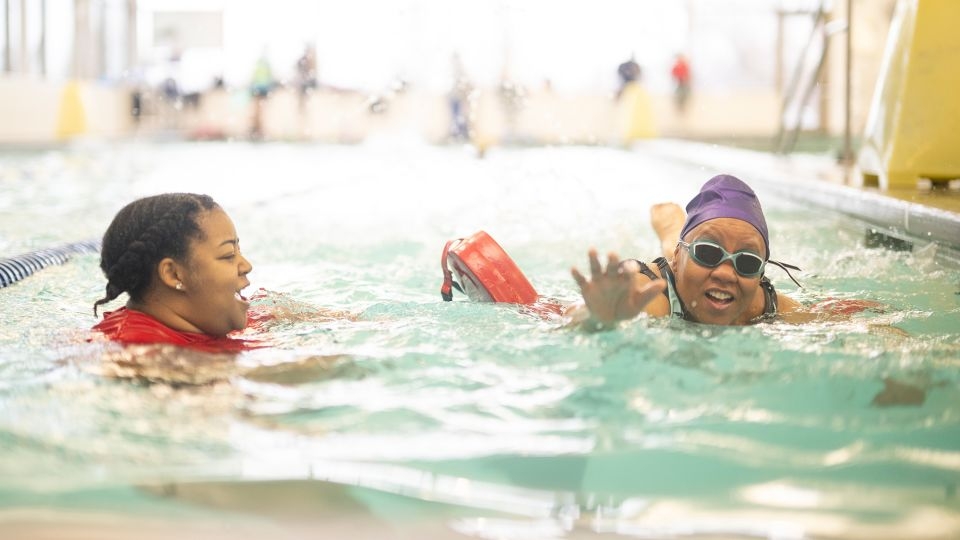 More than 1 in 3 Black adults say they can't swim. This team is trying to teach them and their kids