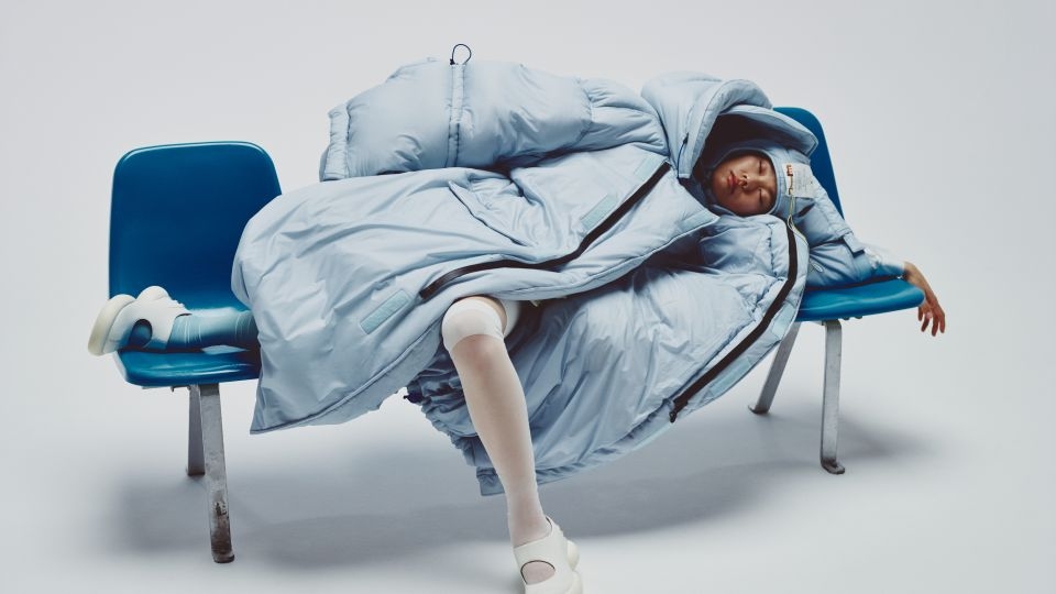 This puffer jacket uses light and sound to lull you to sleep anywhere