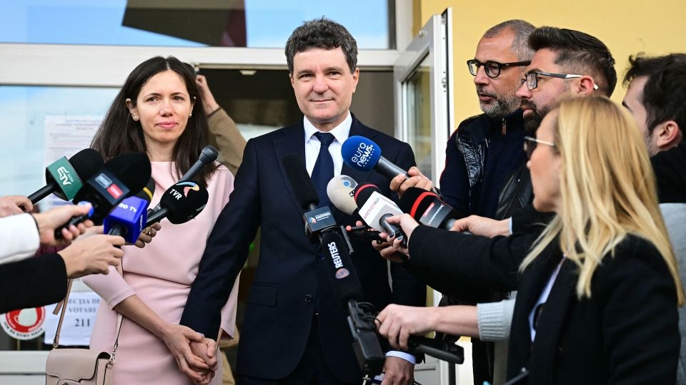 Romania's pro-EU candidate has lead over hard-right nationalist, preliminary election data shows