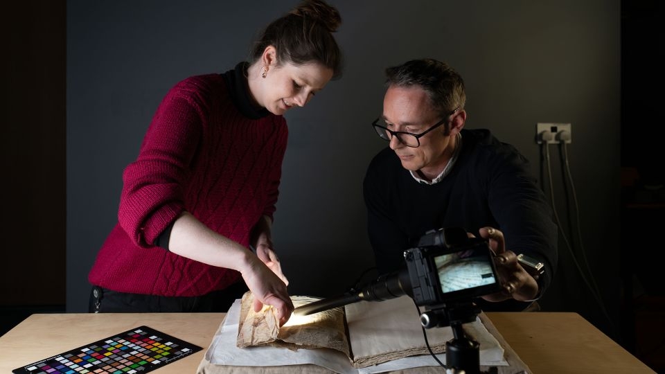 Medieval tale of Merlin and King Arthur found hiding as a book cover