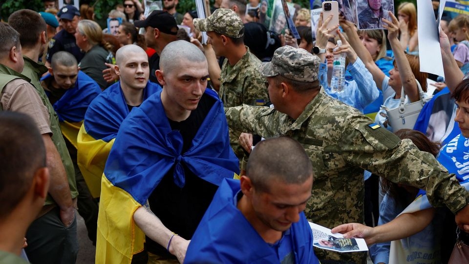 Soldiers return home after years in captivity as Ukraine-Russia prisoner swap begins