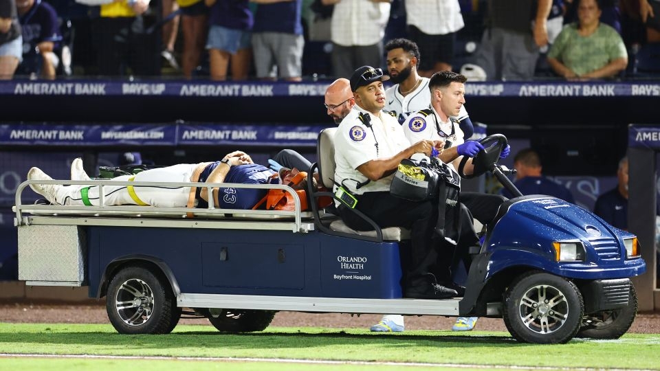Rays pitcher carted off field after foul ball strikes him in dugout