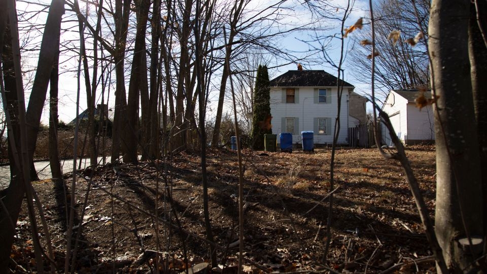 A young man emerged from a burning house after decades of alleged captivity. His city is now reckoning with the fallout