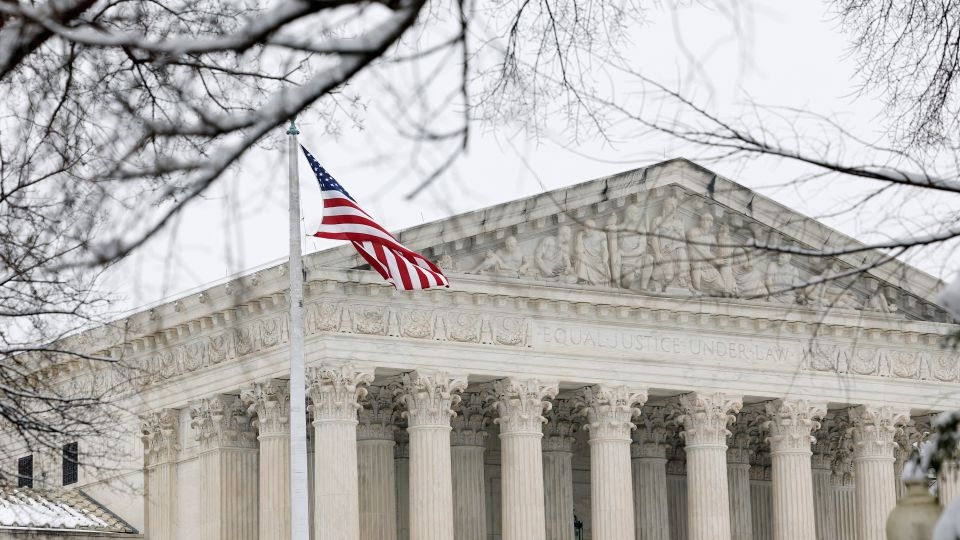 Divided Supreme Court allows Trump administration to begin enforcing ban on transgender service members