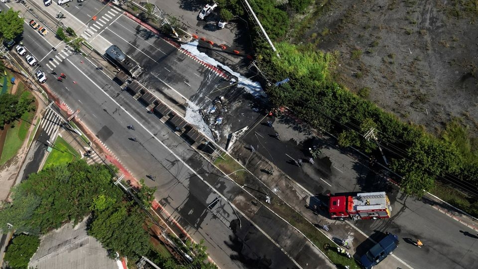 Two killed as small plane crashes into bus on busy road in Brazilian city of São Paulo