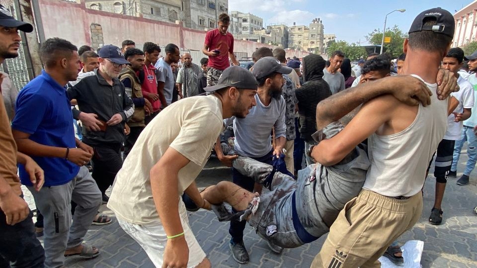 Dozens killed by Israeli fire as they sought desperately needed aid in Gaza, Palestinian health ministry says