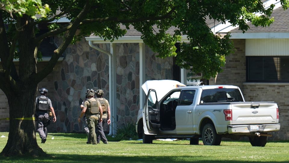 Police: Suspect shot and killed by a security guard after a shooting at a church in Michigan