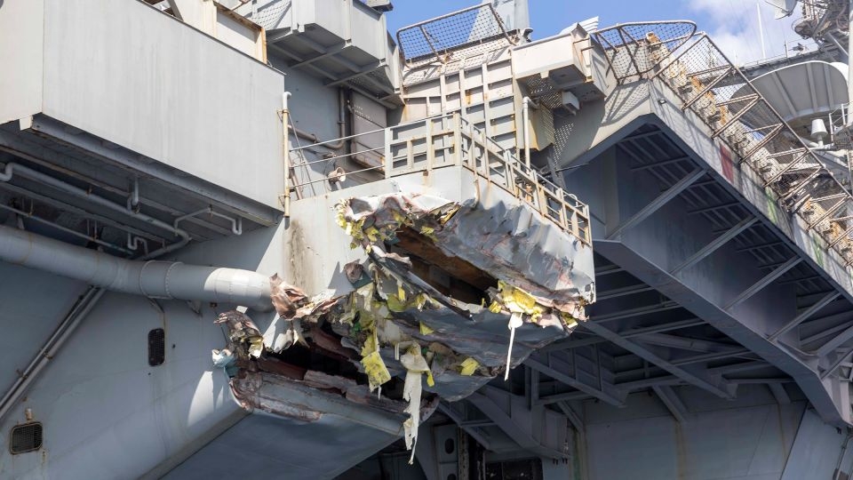 Navy relieves commander of aircraft carrier that collided with ship near Suez Canal