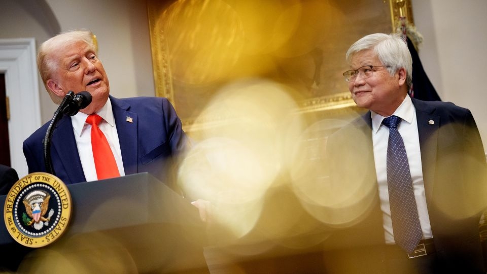 Fear and resignation after ‘world's most powerful company' pays Trump a $100 billion ‘protection fee'