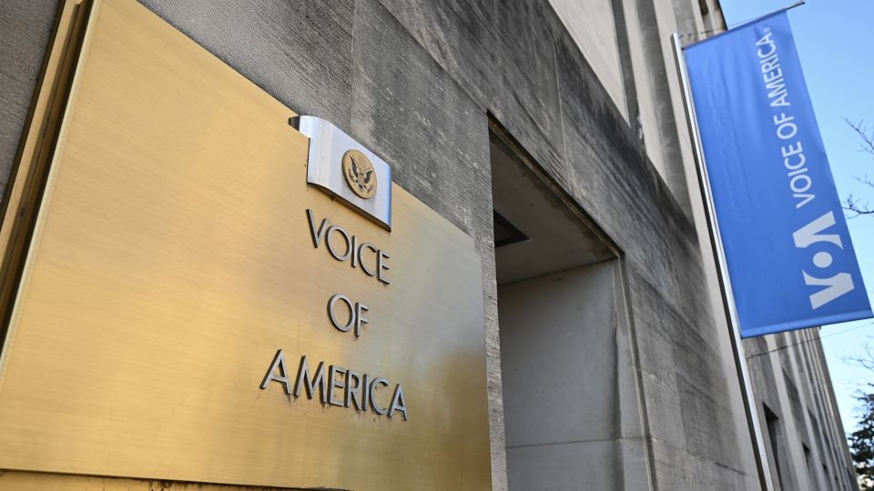 Judge says he'll grant a restraining order to temporarily protect Voice of America
