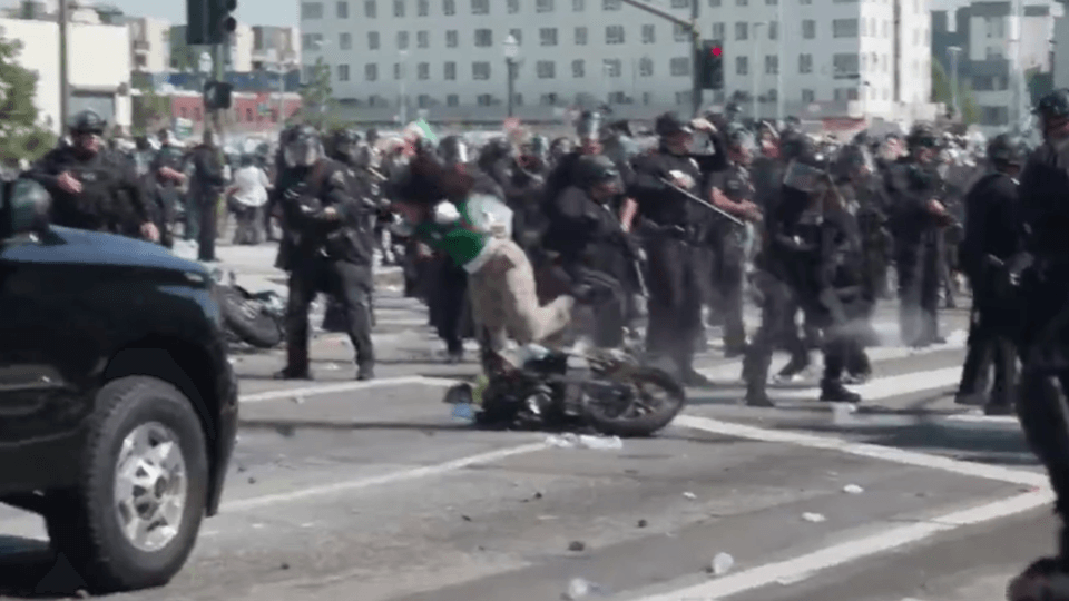 Video shows motorcyclists burst through police line