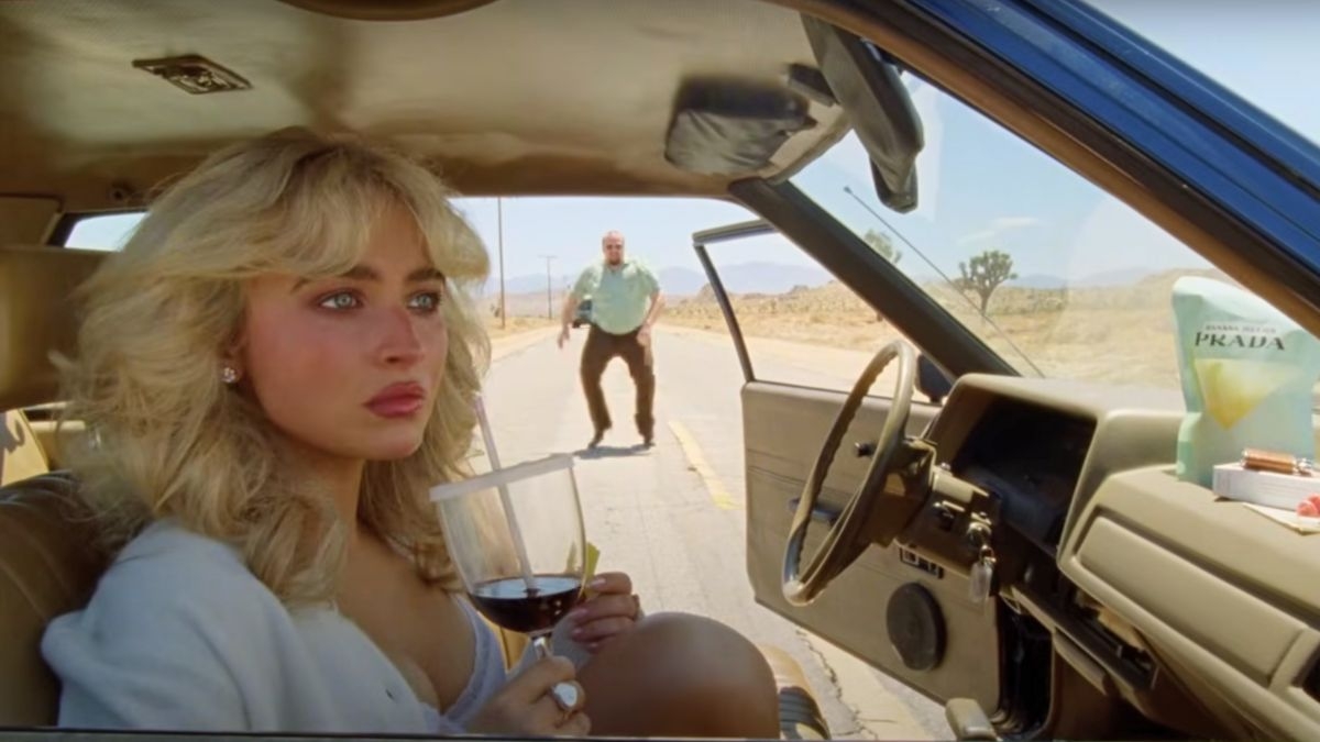 Sabrina Carpenter Hitchhikes Through Mayhem in 'Manchild' Music Video: Watch