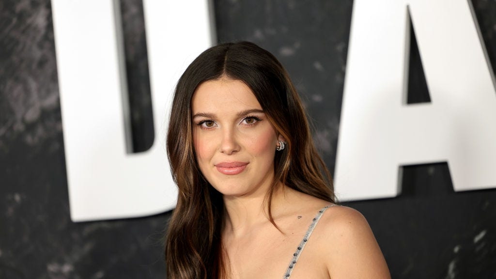 Milly Bobby Brown's Plunging White Swimsuit Is Perfect Bridal Inspo