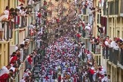 Top photos of thrilling moments and close calls at Spain's San Fermín bull-running festival