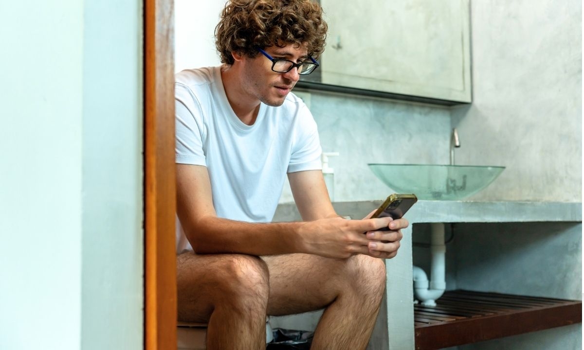 Two Days Down The Drain: Americans Spend 49 Hours A Year Using Phones In The Bathroom