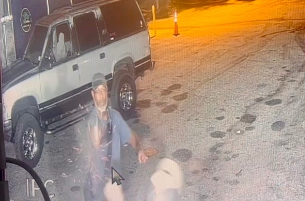 Video depicts man outside McCabe's Bar shooting at man and missing from 3 feet away