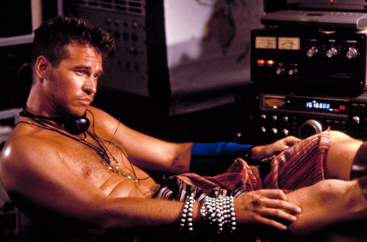 TV Writer Matt Corman Remembers Funny Side Of Former Boss Val Kilmer During ‘Heat' & ‘The Island Of Dr. Moreau' Shoots