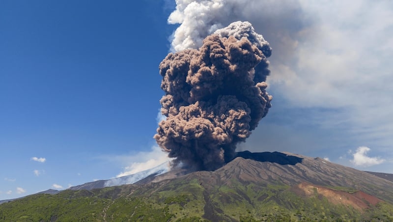 Italy's Mount Etna erupts as tourists visit the volcano