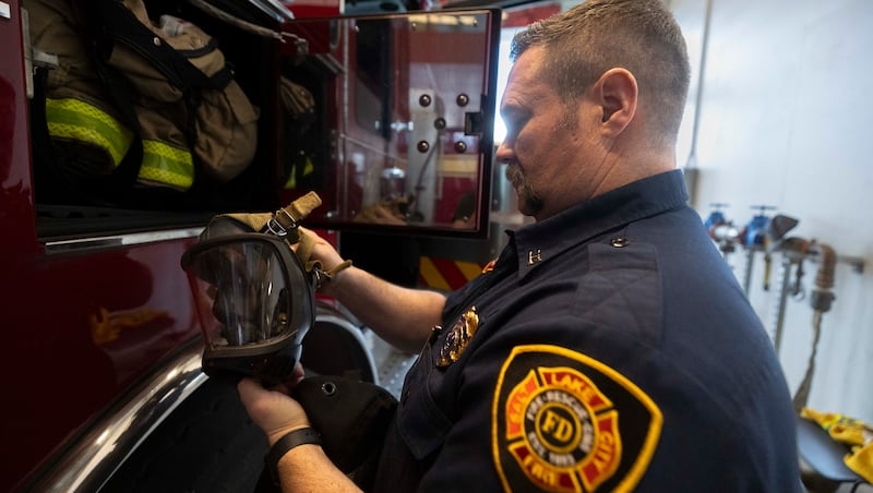 Firefighters gather for the passage of legislation to provide them with regular cancer screenings