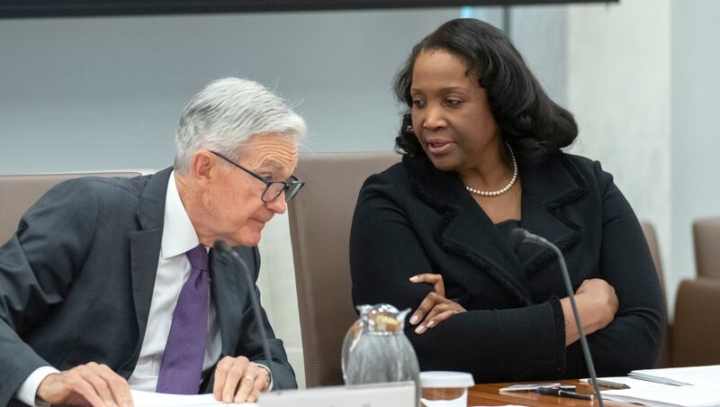 Why does Trump want to fire this member of the Fed board?