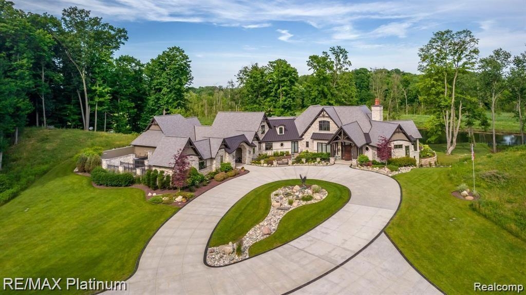 Custom-built Livingston County estate with hunting lodge, 4-acre pond lists for $5.75M