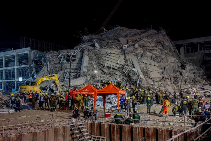 Signs of life under rubble of Bangkok skyscraper after earthquake