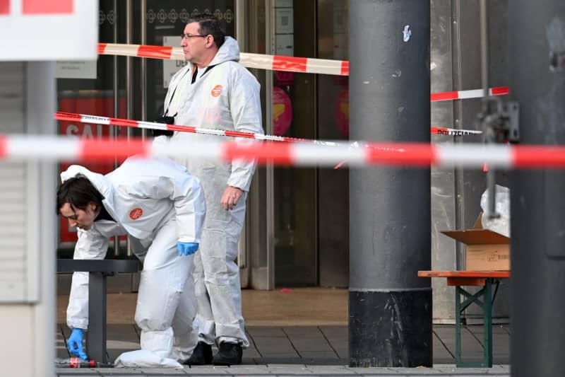 Two dead, 11 injured after car rams into crowd in Germany's Mannheim