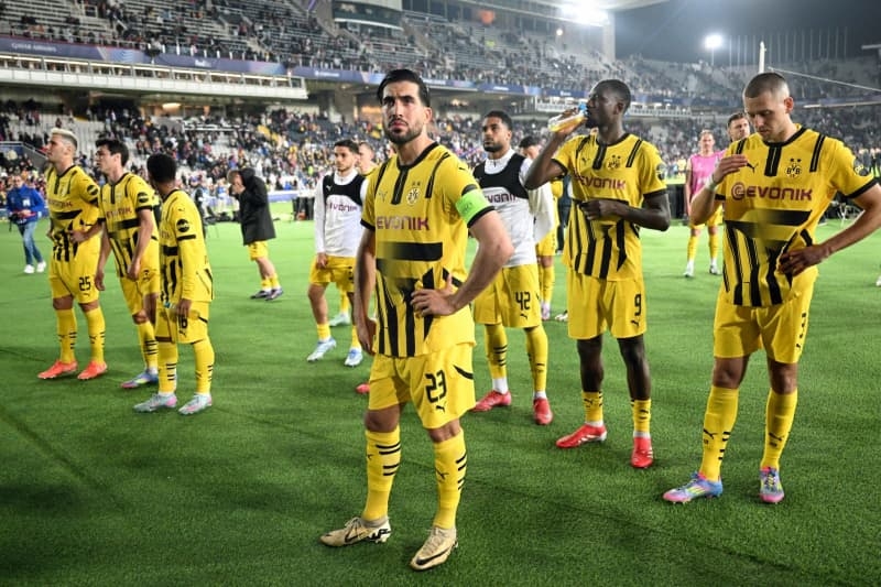 Dortmund captain Can misses team training ahead of Barcelona game