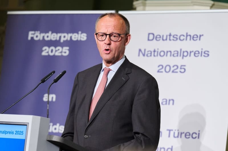 Merz hails BioNTech founders' 'courage' as they receive German prize