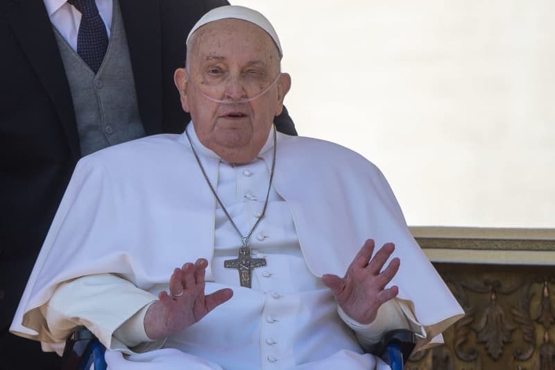 Pope makes surprise appearance in wheelchair at Mass for sick