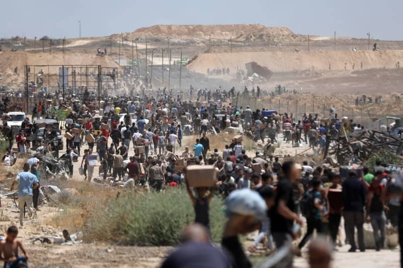 The long and deadly walk Gazans are forced to take for a food parcel