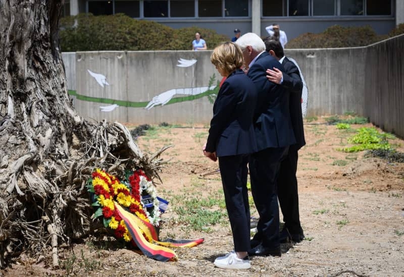 German president recalls hostages' plight on visit to kibbutz Be'eri