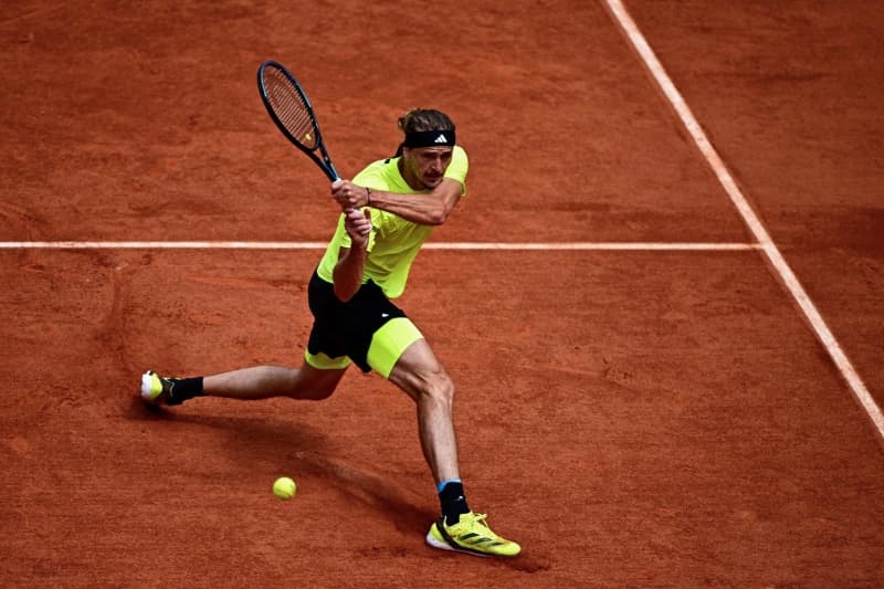 Zverev swallows fly but reaches Paris quarters as Griekspoor quits