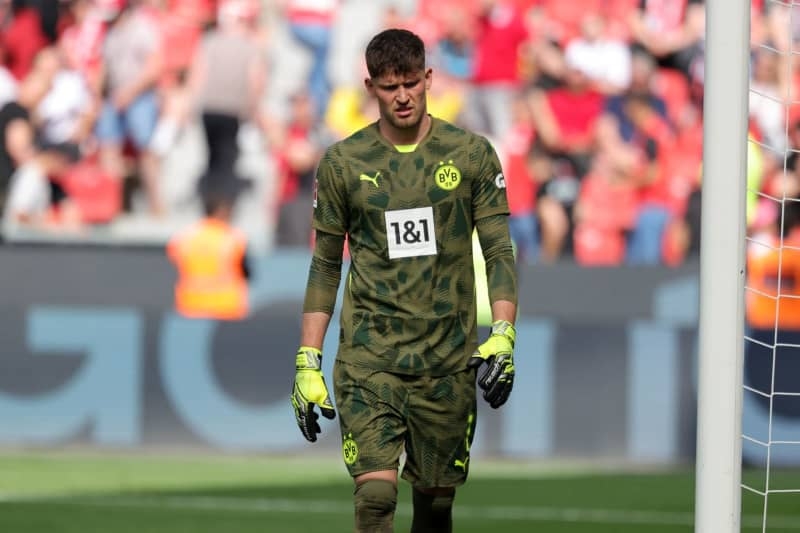 Dortmund keeper Kobel fine after heavy collision