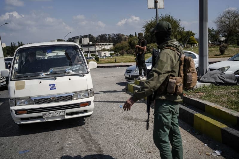 Fear lingers after Syrian violence as hundreds seek refuge