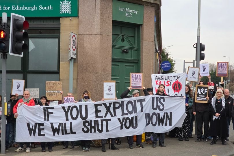 Edinburgh anti-disability cuts protestors surround Ian Murray MP's office