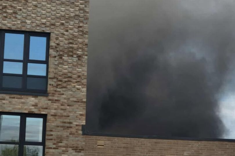 Edinburgh fire crews race to blaze on busy road as smoke plumes into sky