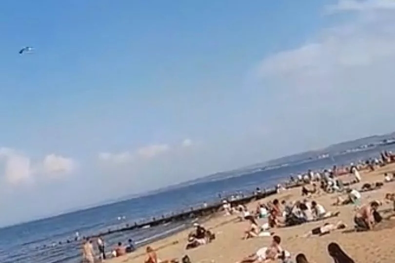 Thousands of sun worshippers swarm Edinburgh seaside promenade during heatwave