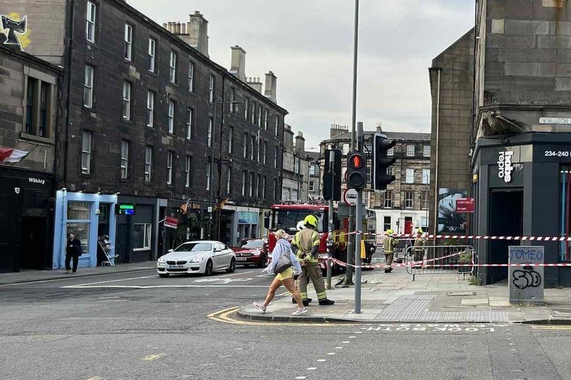 Busy Edinburgh pavement taped off as fire crews race to West End incident