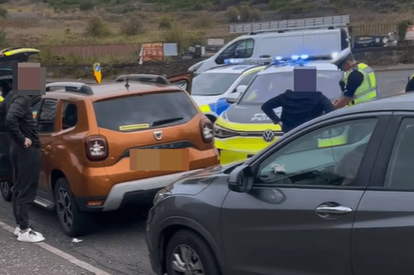 Major Edinburgh police response to 'ongoing incident' involving BMW on busy road